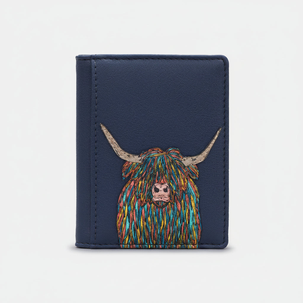 Highland cow flap-over card holder in navy vegan leather, front view on grey