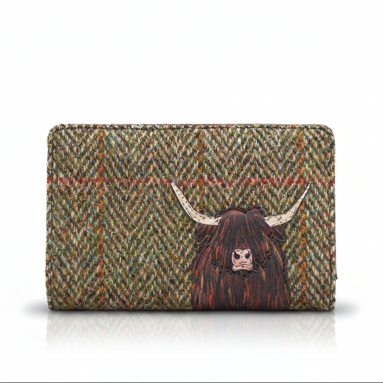 Highland cow flap-over purse in green tweed-effect vegan leather, front view on grey