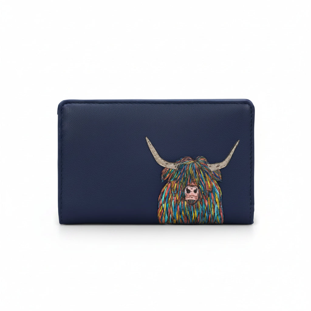 Highland cow flap-over purse in navy vegan leather, front view on grey