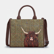 Highland cow tote bag in green tweed-effect vegan leather, front view on grey