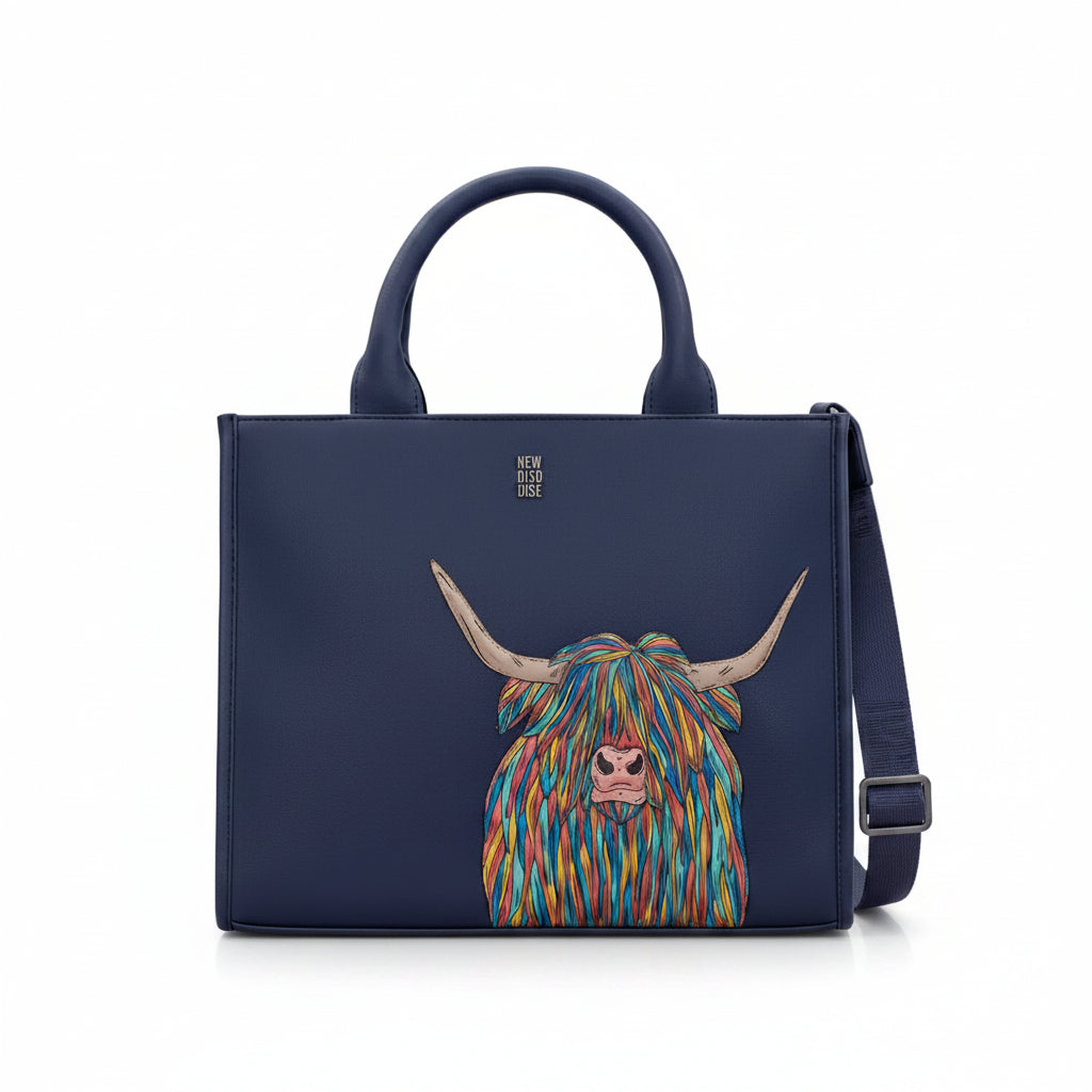 Highland cow tote bag in navy vegan leather, front view on grey