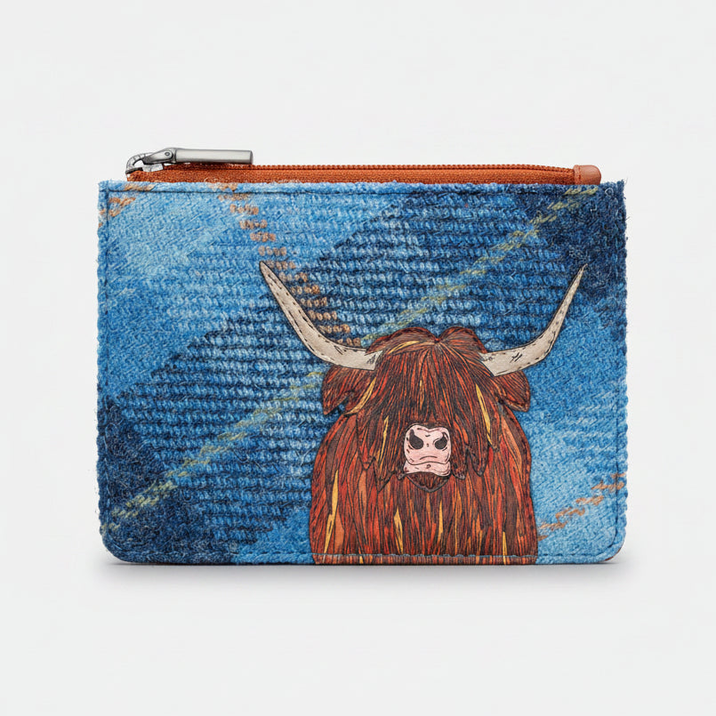 Highland cow zip-top purse in blue tweed-effect vegan leather, front view on grey