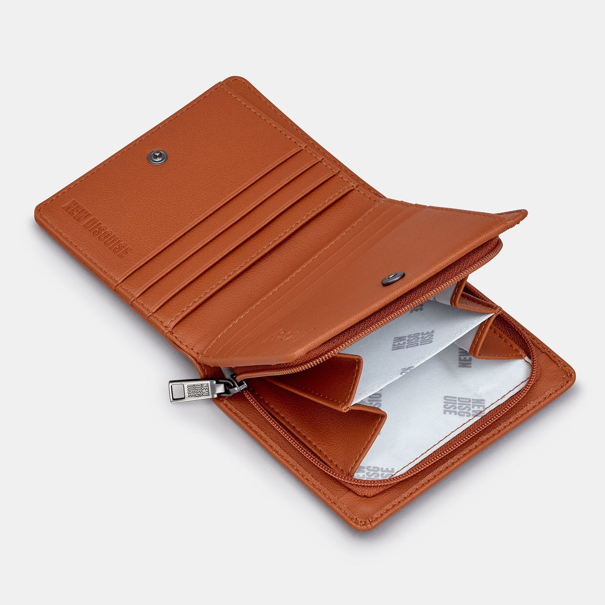 Jane Austen Library Purse in book spine print, tan trim, open with the coin pocket unzipped