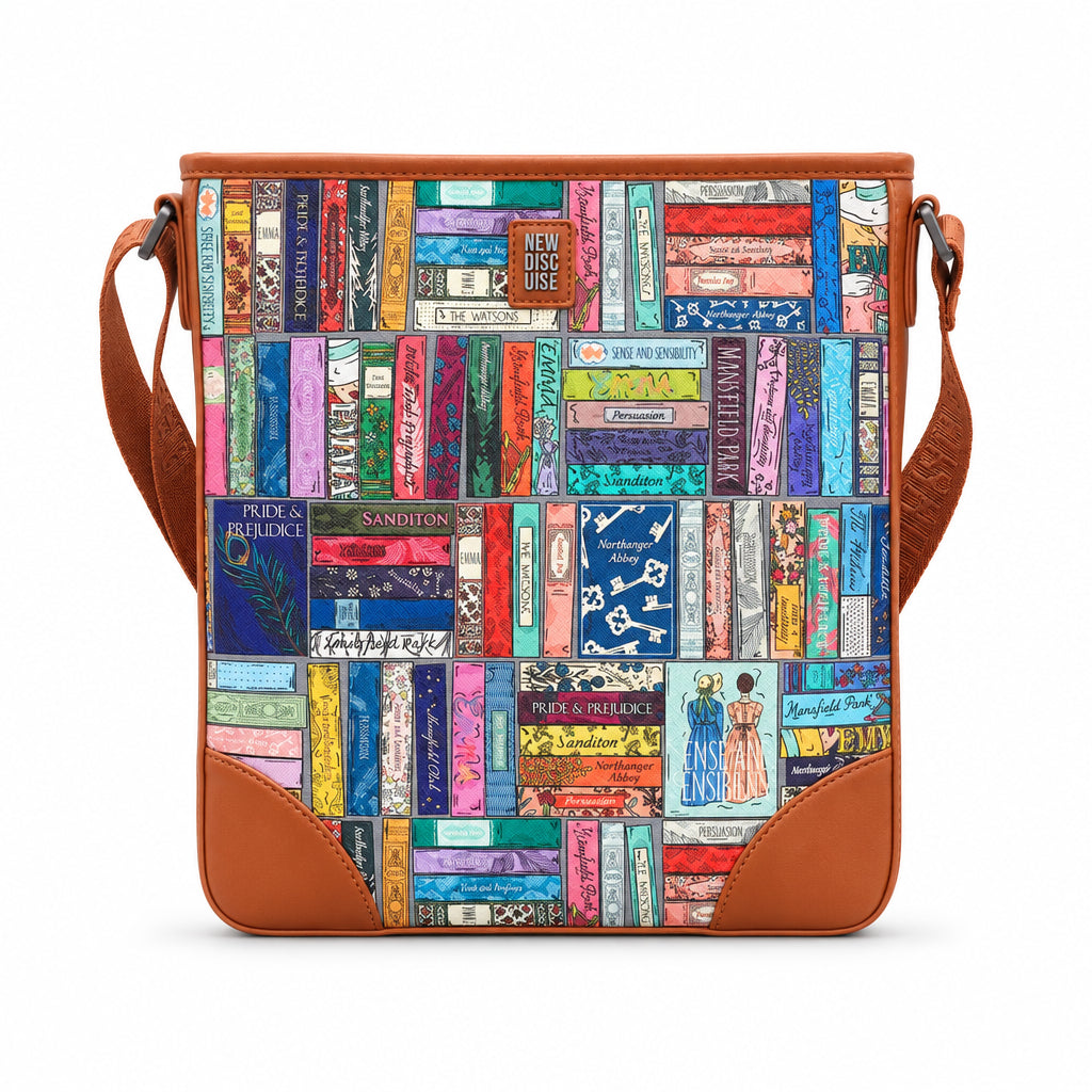Jane Austen Library Maxi Cross Body Bag in book spine print, tan trim, front view on grey
