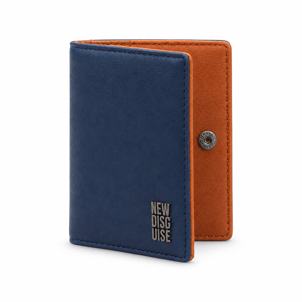 Nolan Card Holder in navy and tan, front view on grey