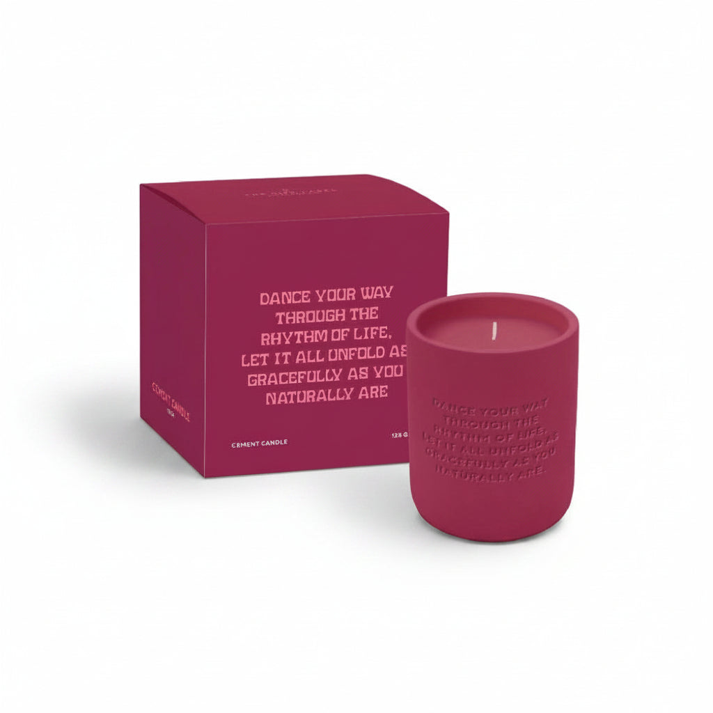 Burgundy cement candle with matching burgundy gift box on white