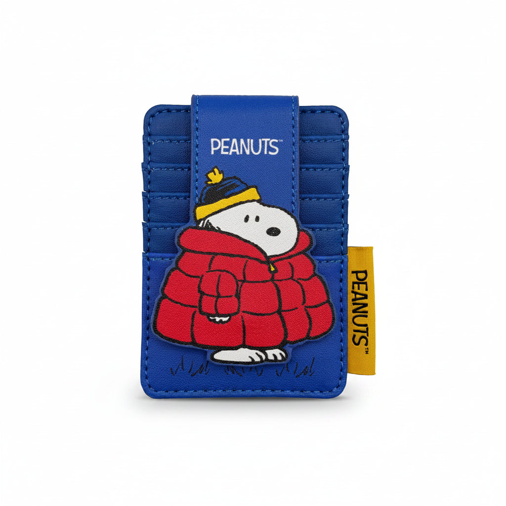 Front studio image of Peanuts Snoopy Coat Foldover Card Holder with Snoopy in red coat and yellow hat on blue PU leather.