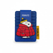Front studio image of Peanuts Snoopy Coat Foldover Card Holder with Snoopy in red coat and yellow hat on blue PU leather.