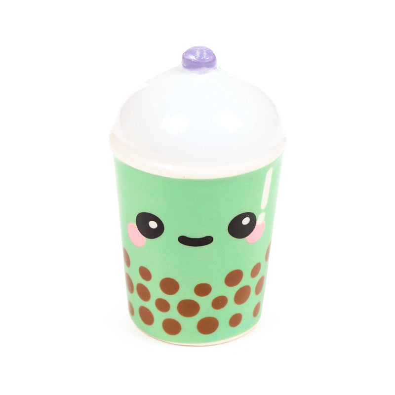 Green matcha bubble tea shaker with a lilac domed lid