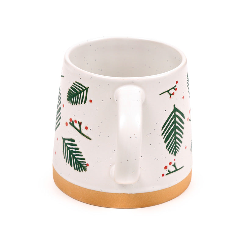Pine sprigs stoneware mug seen from behind with the handle hidden