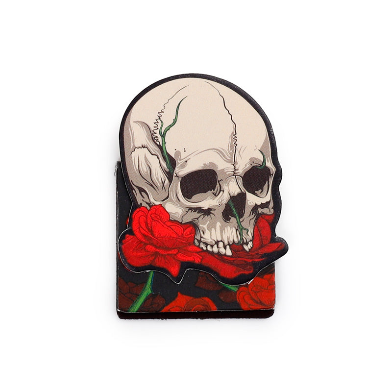 Detailed skull magnetic bookmark with roses across the jaw