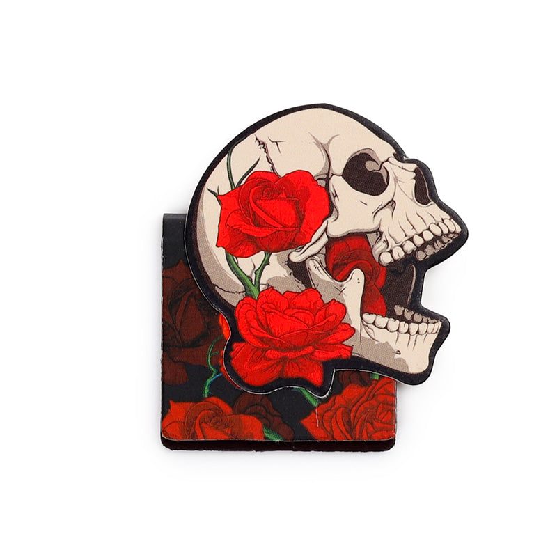 Side facing skull magnetic bookmark surrounded by red roses