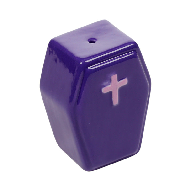 Deep purple ceramic coffin shaker with a raised cross on the lid