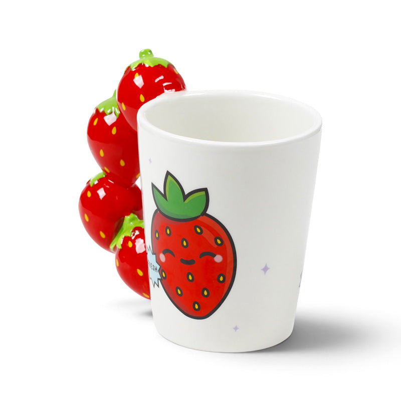 Strawberry handle mug viewed from an angle on a white background