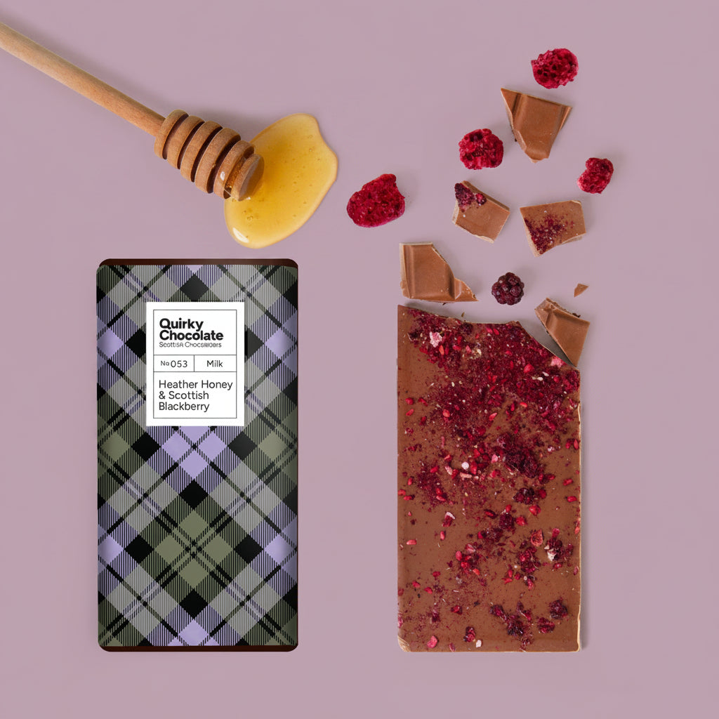 Chocolate bar with plaid packaging and a honey dipper on a white background