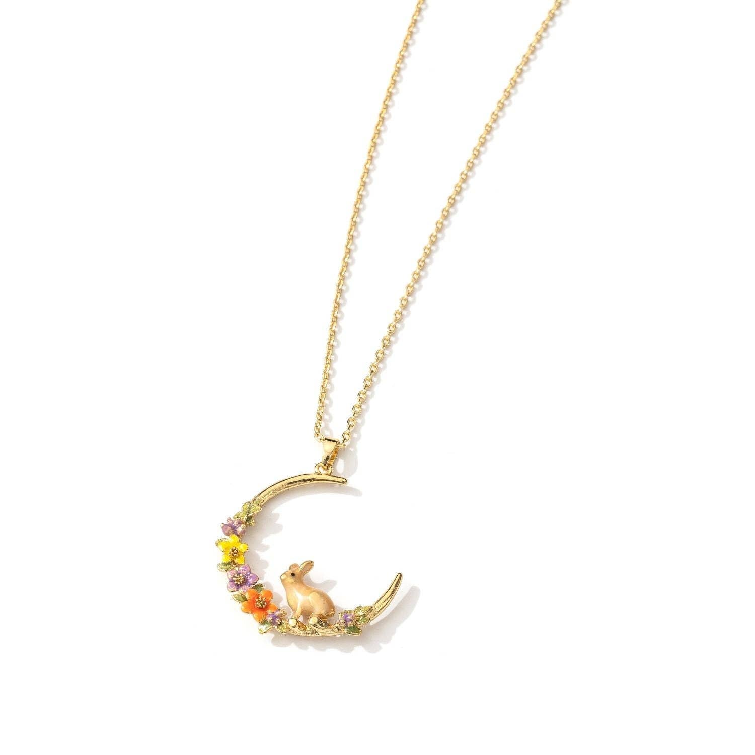 Close-up of Bill Skinner Rabbit Hoop Necklace showing intricate floral enamel details.