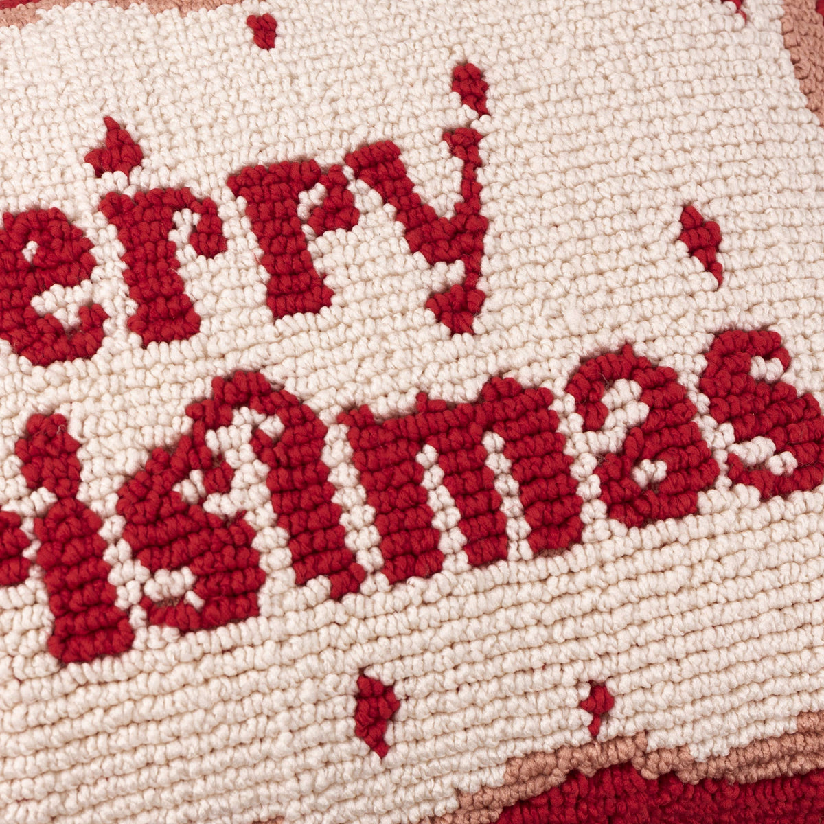 Close up of the tufted Merry Christmas lettering