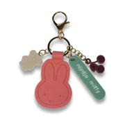Coral Miffy silicone bag charm on a pure white background