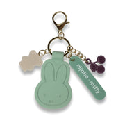 Mint green Miffy silicone bag charm on a pure white background