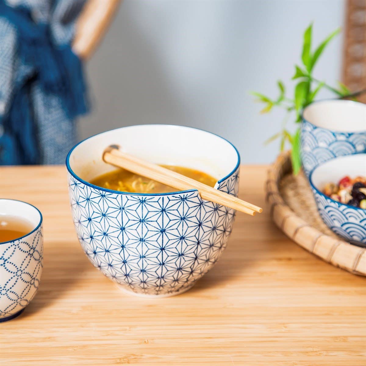 Blue sashiko star pattern ceramic noodle bowl with bamboo chopsticks
