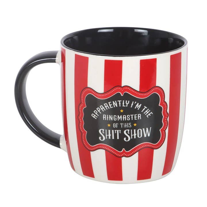 Close-up of ceramic mug showing ringmaster quote on white background