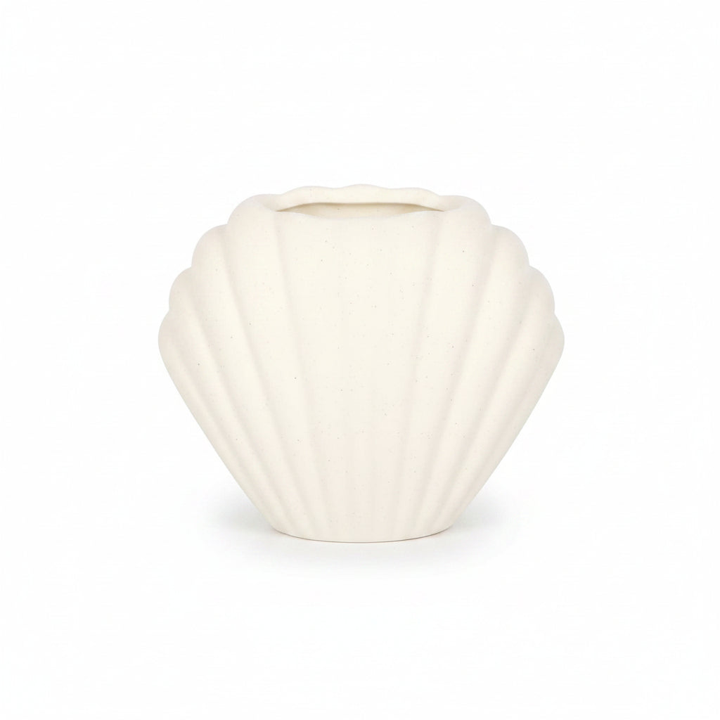 Seashell oil burner in home setting with soft lighting
