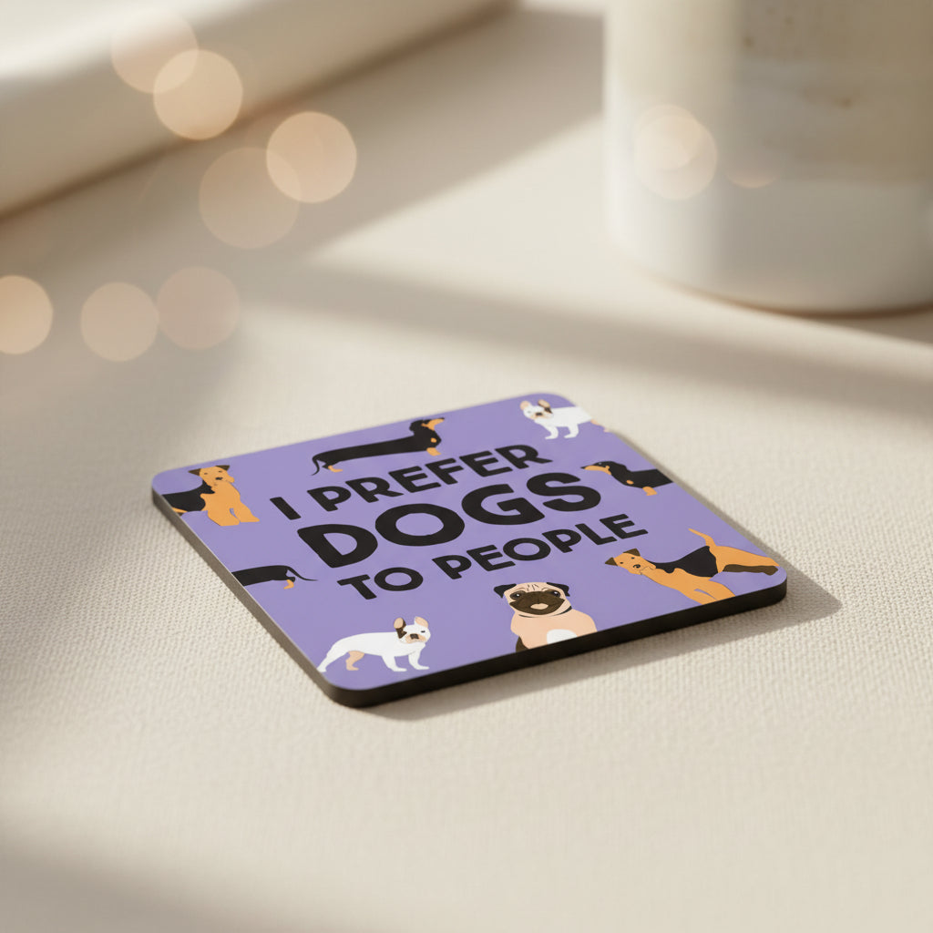 Purple square with cartoon dogs and text 'I prefer dogs to people' on a white background