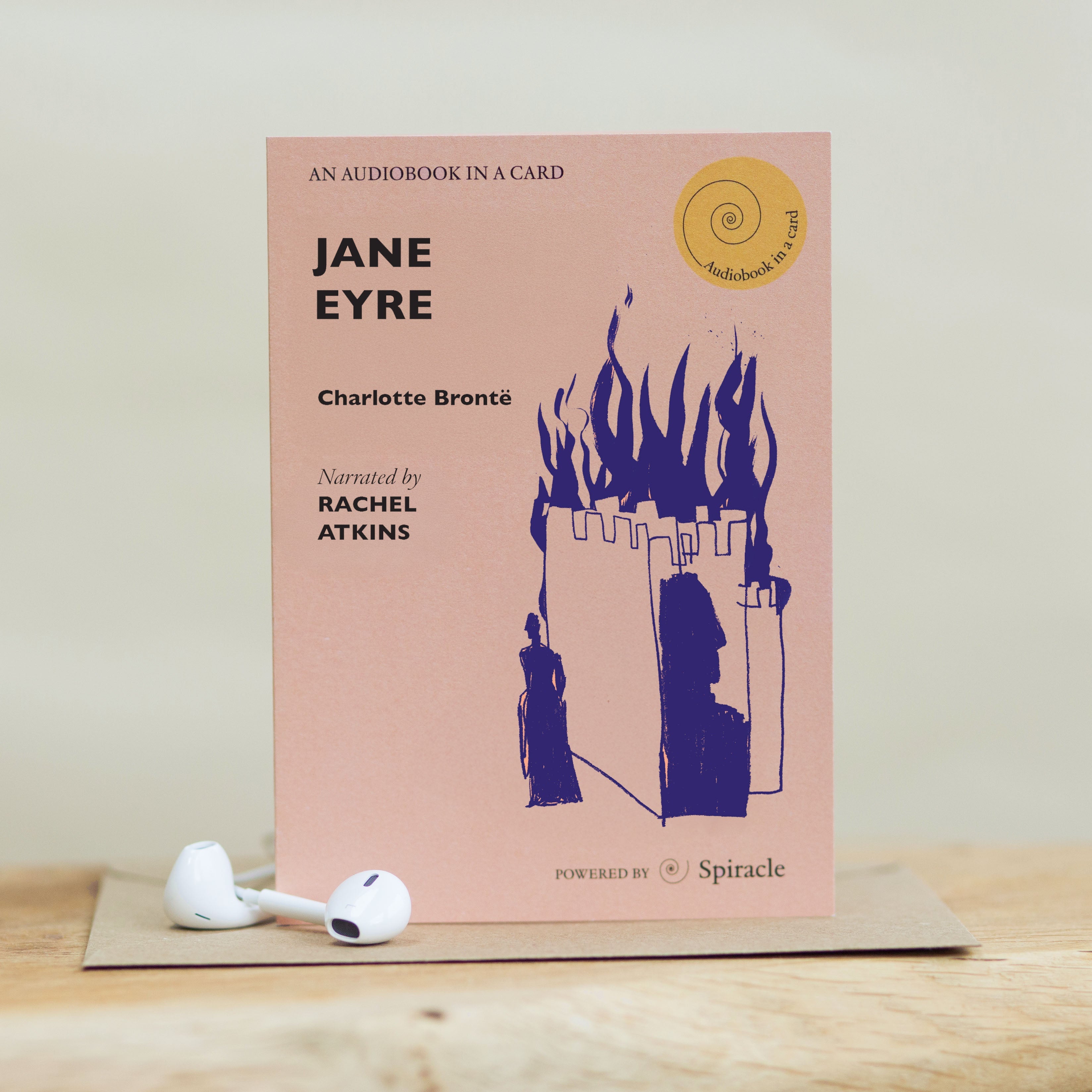 Jane Eyre audiobook card styled on a table with the kraft envelope behind