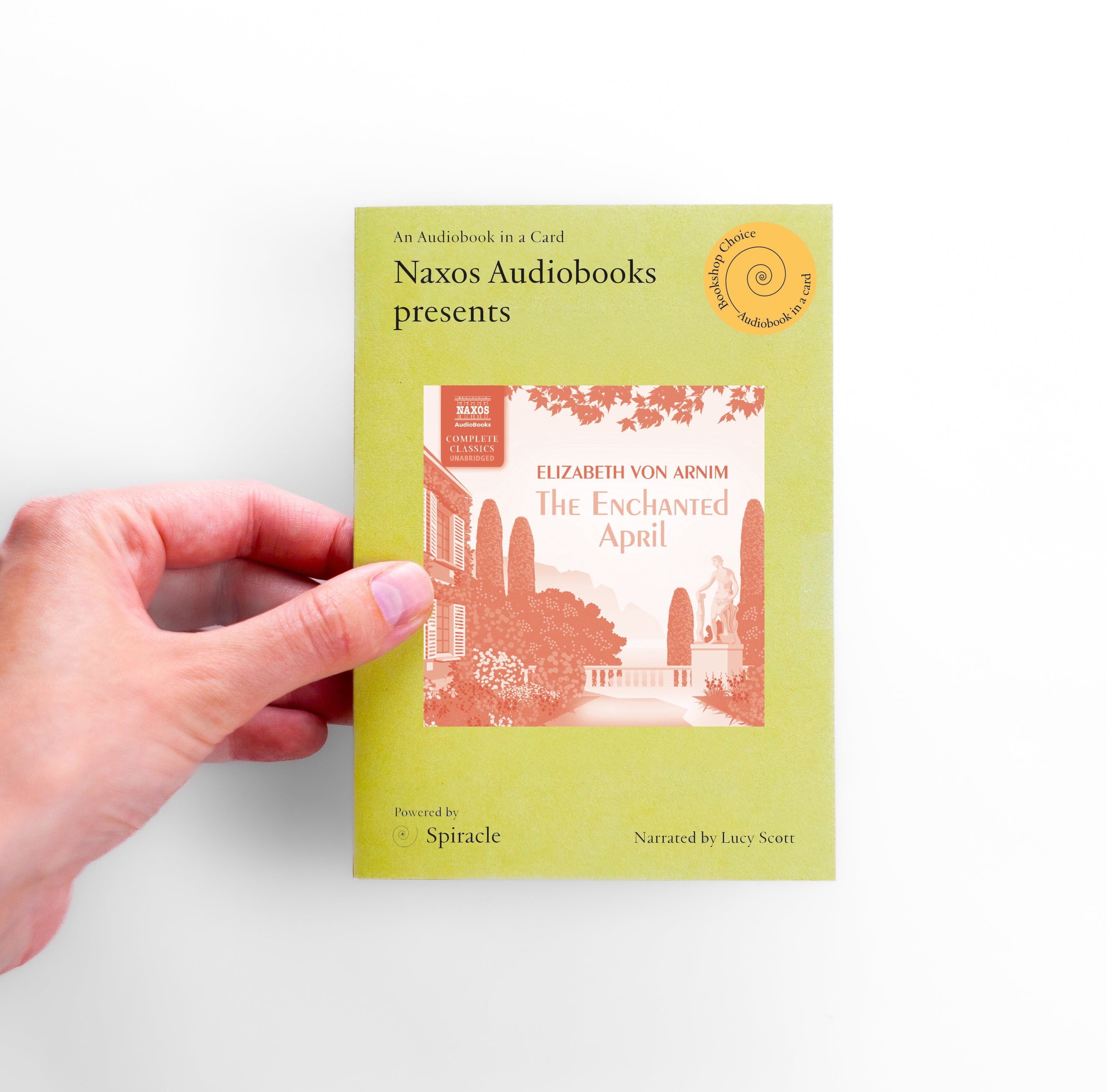 Hand holding The Enchanted April audiobook card to show its size