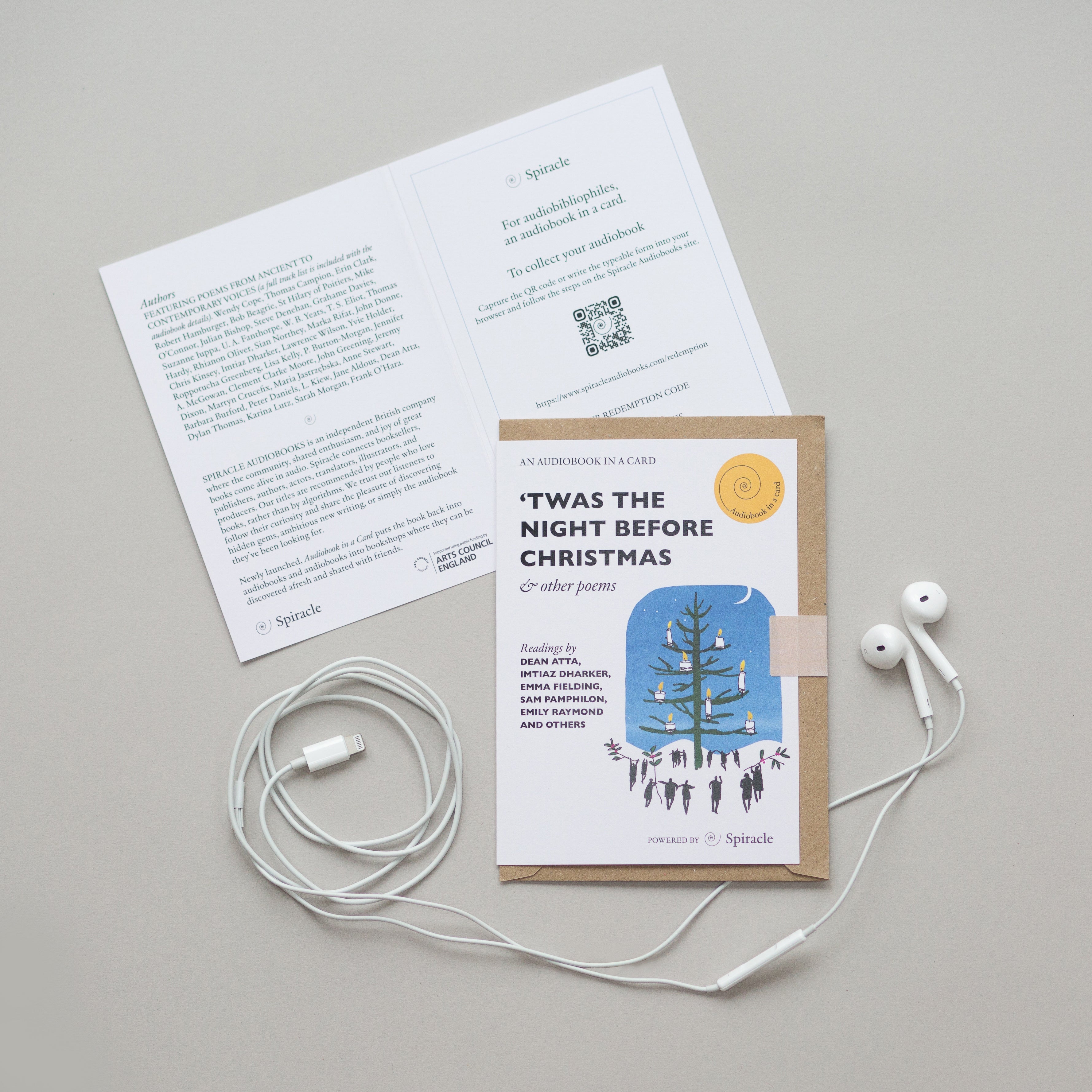 Christmas audiobook card opened to show the blank inside and QR code