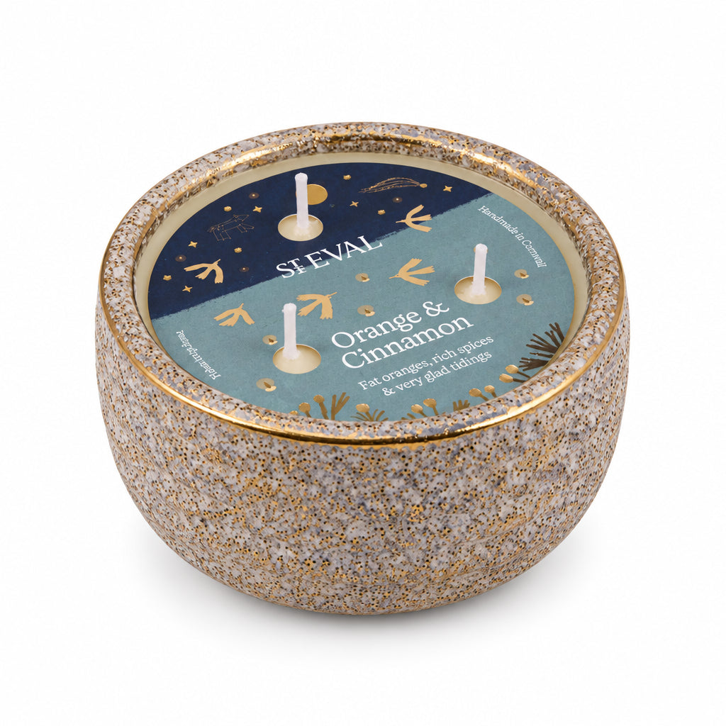 Orange & Cinnamon Small Alchemy Pot Candle with illustrated lid label on a cream background