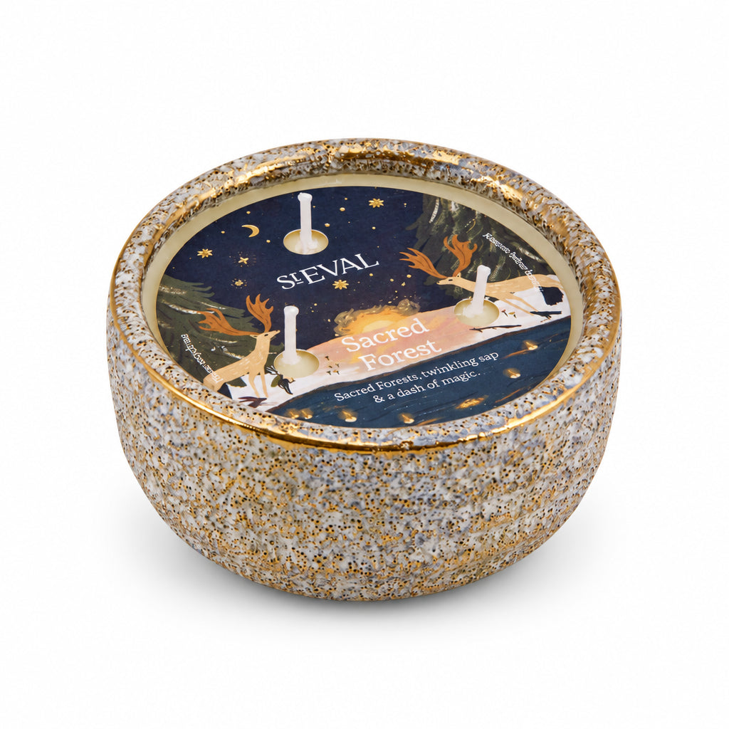 Sacred Forest Small Alchemy Pot Candle with illustrated lid label on a cream background