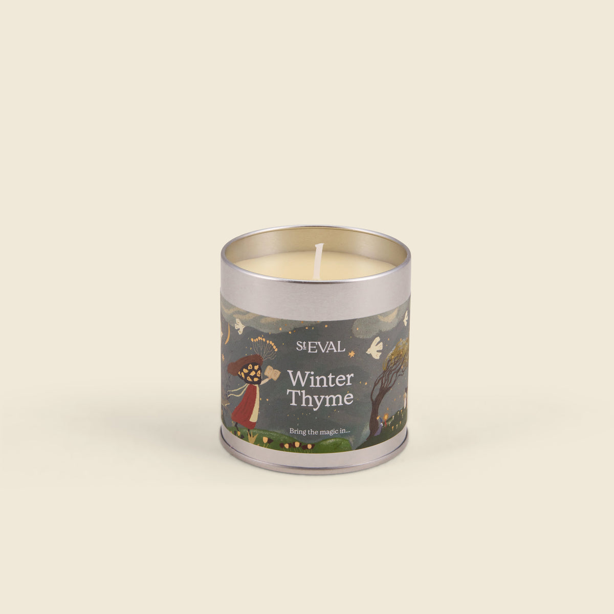 Winter Thyme Christmas Tin Candle with the lid off showing the wax, cream background