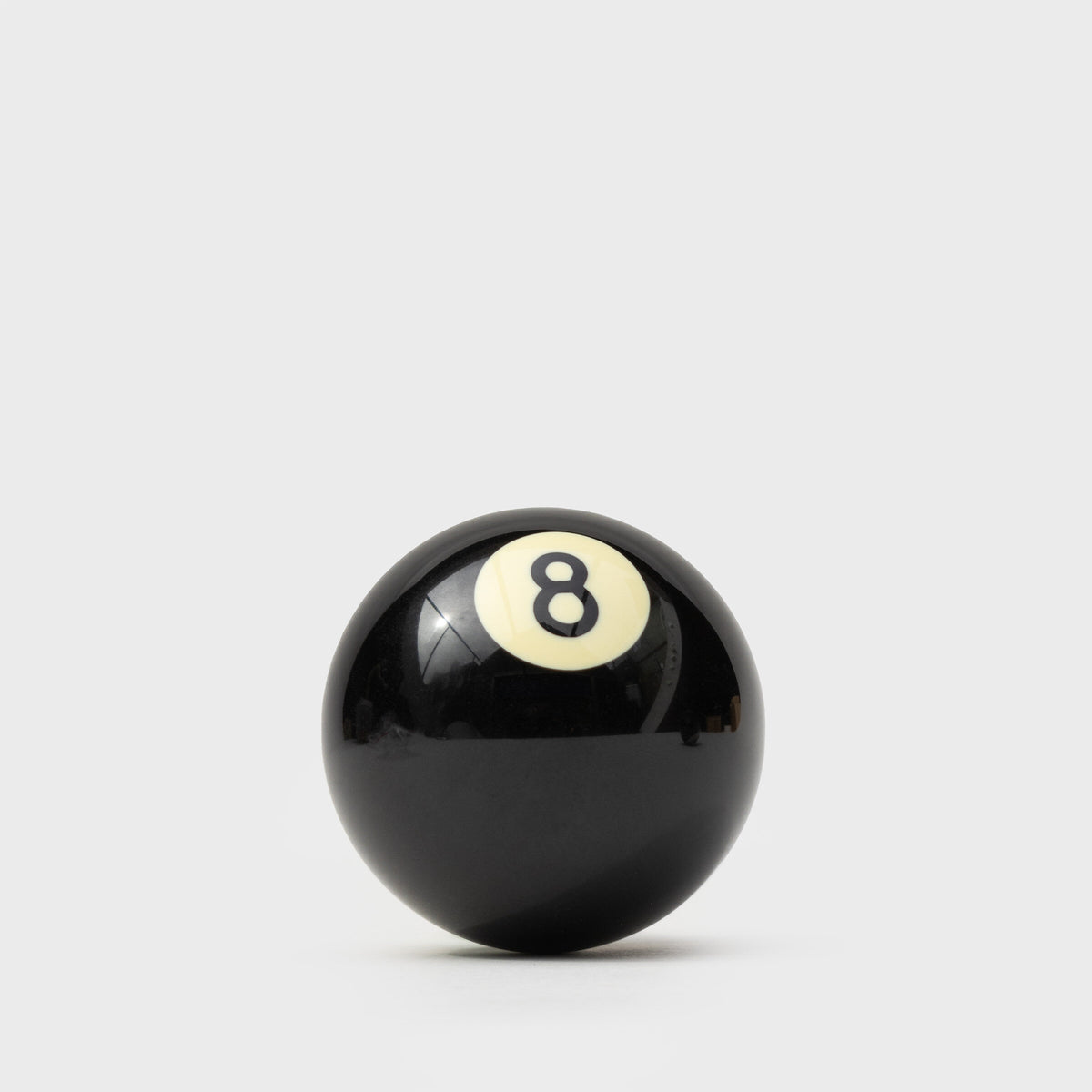 Black number 8 pool ball bottle opener seen from the front