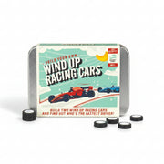 Wind up racing cars assembled from DIY kit on table