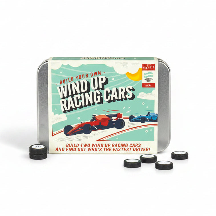 Wind up racing cars assembled from DIY kit on table