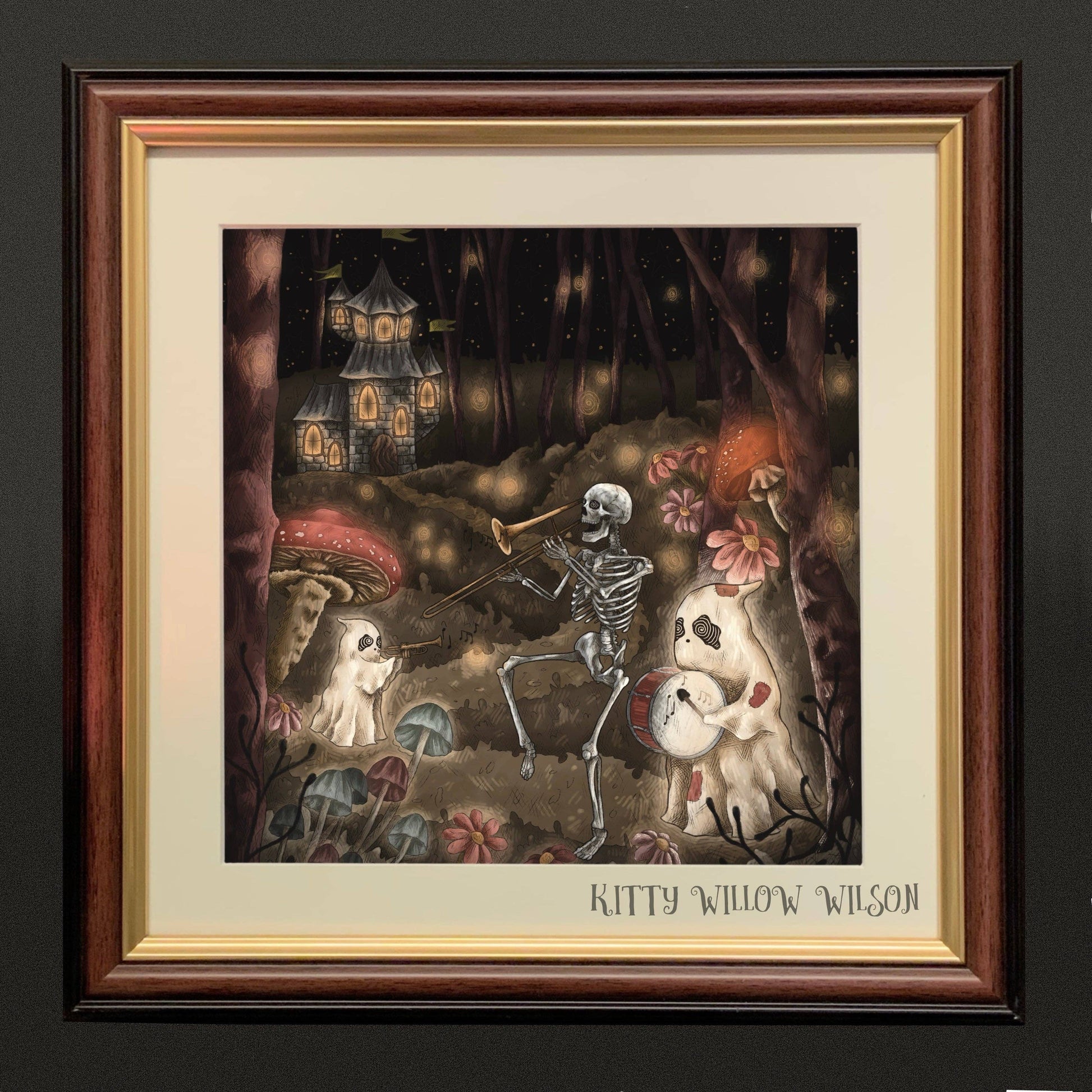 Art print of a skeleton playing violin as ghosts dance by a cottage, shown framed