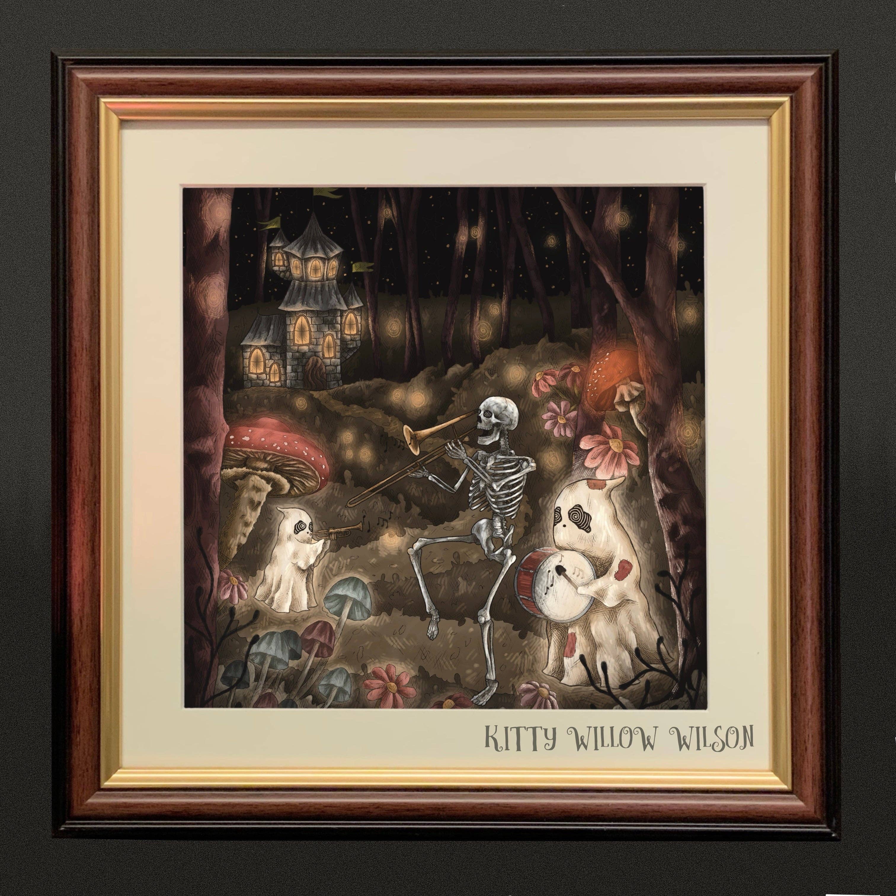 Art print of a skeleton playing violin as ghosts dance by a cottage, shown framed