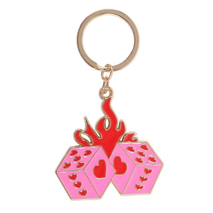 Y2K style flaming dice keyring on a roll of the dice card