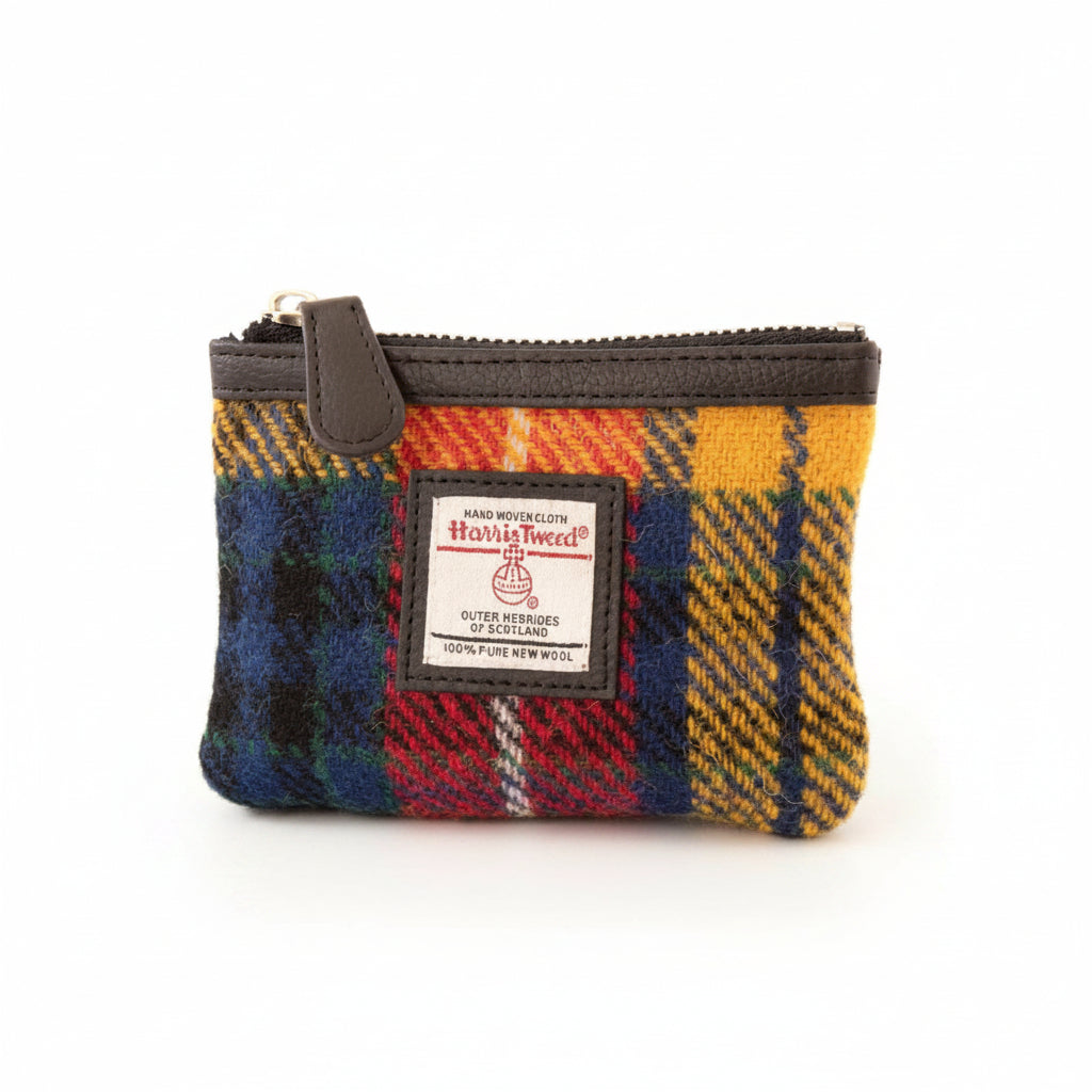 Maccessori Harris Tweed coin purse in a multicolour tartan design of yellow, red, blue and orange.